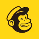 Mailchimp logo with cartoon monkey wearing a cap
