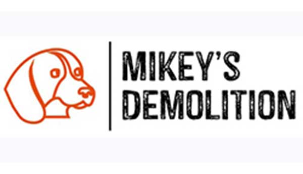 Mikey's Demolition logo with orange dog illustration